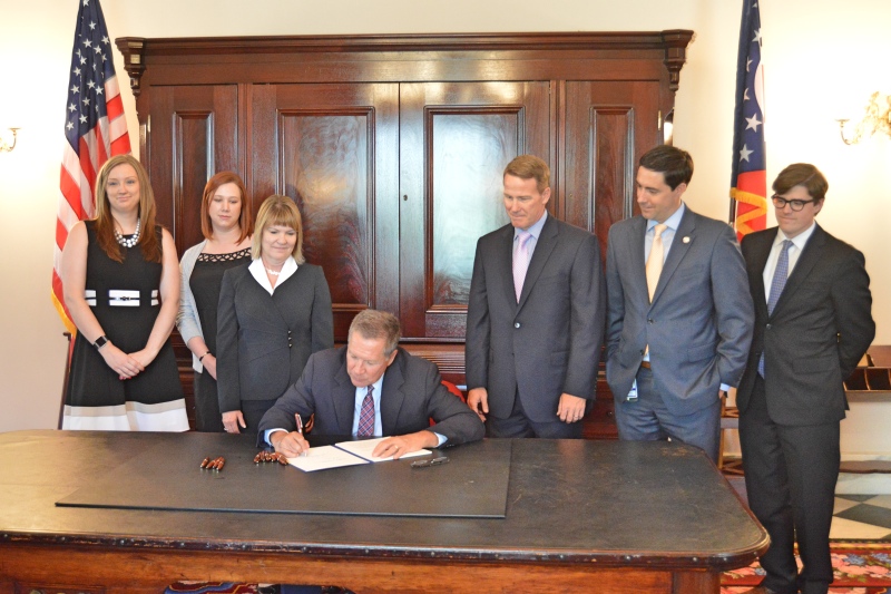 From ohiosenate.gov - "Senator LaRose (second from right) joins Secretary Husted (third from right) and local elections officials for signing of Senate Bill 63"